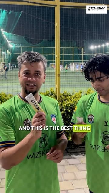 Players at Namma Bengaluru League holding Flow sachets